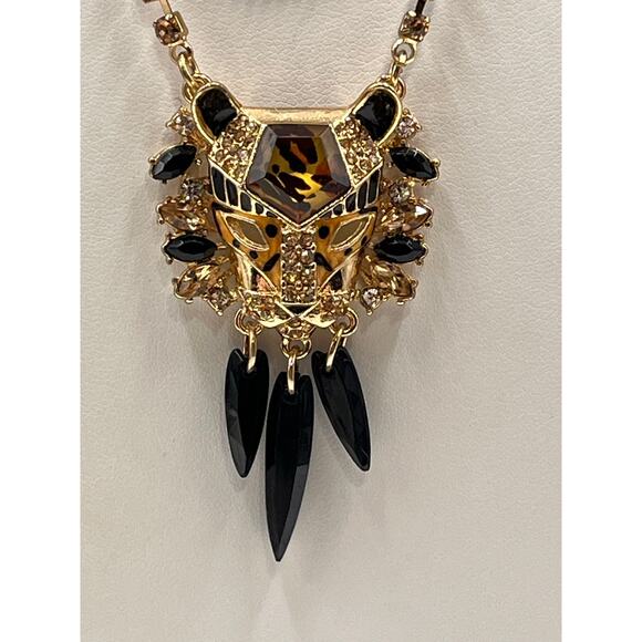 Betsey Johnson Hollywood
Glam Leopard Tiger Head Dangle Bow Gold Necklace - Picture 5 of 12